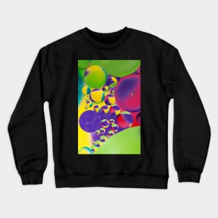 Colorful close up of oil drops in water Crewneck Sweatshirt